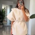belted fur poncho with epaulettes