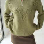 Olive green sweater with design
