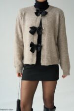 Beige Knit Cardigan with Black Bows - Image 2
