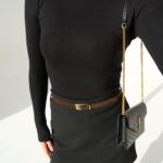 Basic black sweater with hold buttons